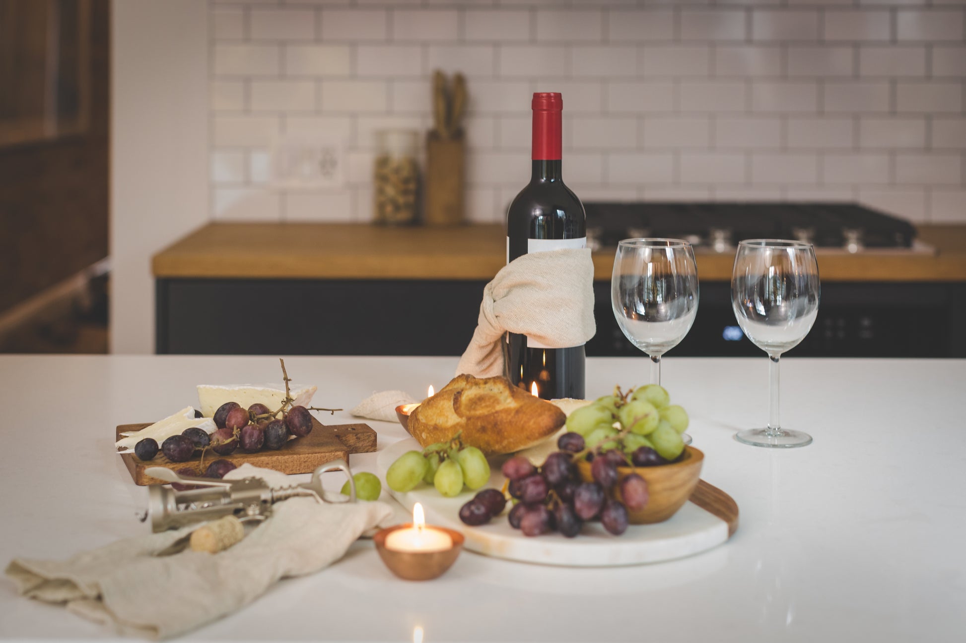Crooked Brook Wines Single Vineyard Wine Club Membership – Ferguson Valley, Western Australia - image of wine bottle with glasses, grapes and cheese with a candle
